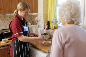 Picture of a carer and elderly lady